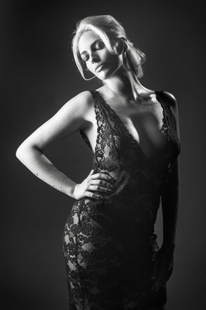 Young woman studio fashion portrait. Black and white.の写真素材