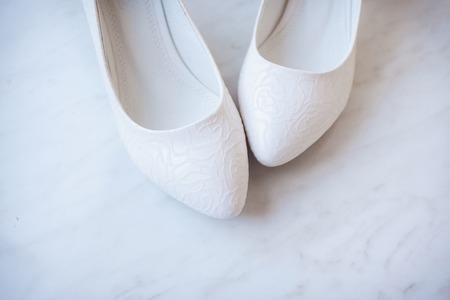closeup photo of beautiful bride's shoesの写真素材