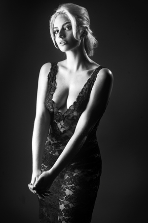Young woman studio fashion portrait. Black and white.の写真素材