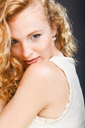 Portrait of beautiful lady on grey. Studio shotの写真素材