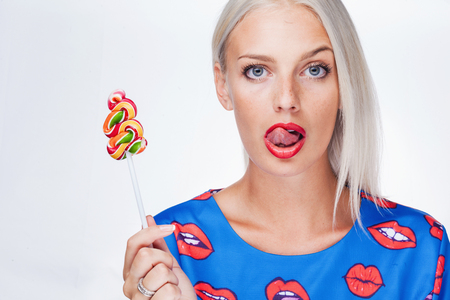 portrait of a girl with lollipopの写真素材