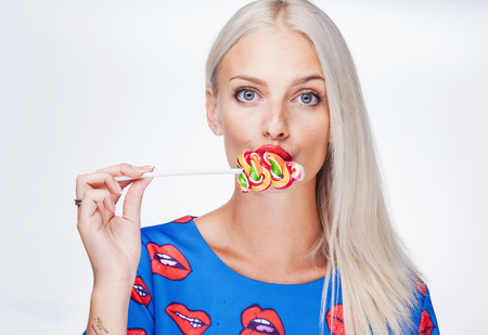portrait of a girl with lollipopの写真素材