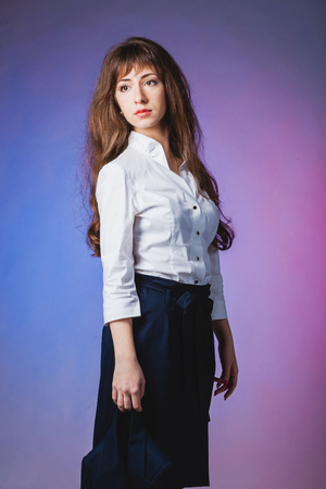 Beautiful woman with colored backgroundの写真素材
