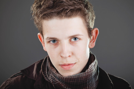 attractive young man wearing elegant shirt and  scarfの写真素材