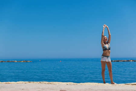 Young woman enjoying beautiful day at the beach. Cyprusの写真素材