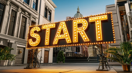 A vibrant illuminated start sign stands at the entrance of a bustling urban street, inviting excitement and energy. The marquee adds a festive touch to the cityscape.の素材