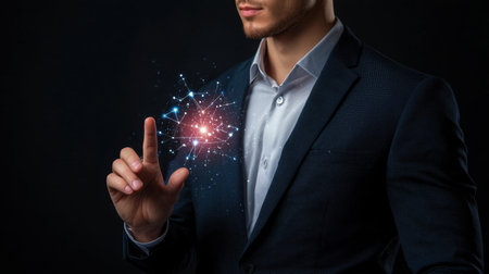 A confident man in a suit illustrates an innovative concept with a finger gesture, showcasing a fusion of technology and creativity in a dark atmosphere.の素材