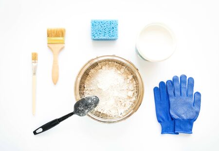 Set of house repair constructing and painting equipment on white background. White and blue composition. Flat lay, top viewの写真素材