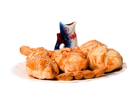 Fresh and tasty, sweet pastries isolated on a white background on a white plateの写真素材