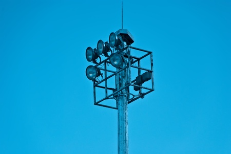 Spotlight light with light blue sky. It is in a sport stadium. の写真素材