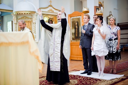 Wedding of newlyweds in the church. Kazakhstan - Almaty, 18 July 2010
