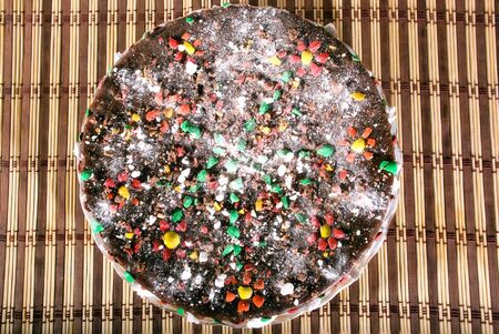 Biscuit Chocolate Cake decorated with sweet icing