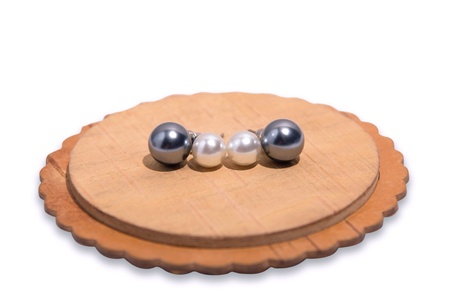 Closeup of circle earrings on a white background.の写真素材