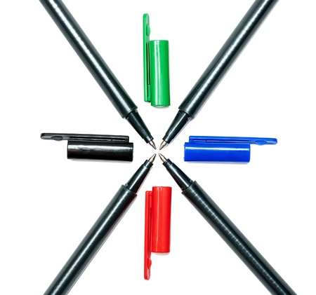Colored pens lying in a cross on a white background.の写真素材