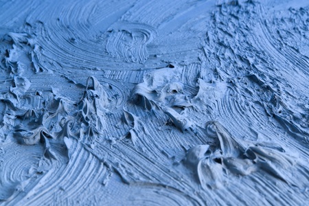 blue abstract painted background with thick paintの写真素材