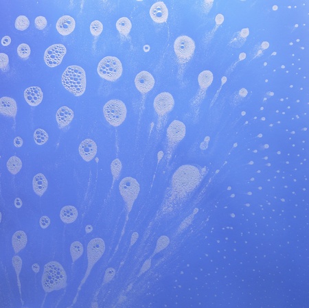 abstract wet blue background with soap bubble conglomerations