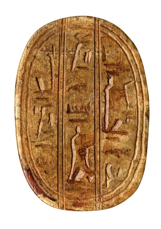 brown stained plate with carved egyptian symbols isolated on white with clipping path