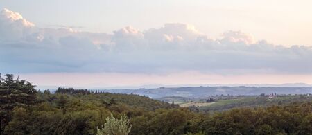 idyllic scenery near a small village named San Regolo in the Chianti region (Tuscany, Italy) at evening timeの写真素材