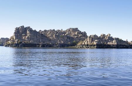 landscape including river nile and rock formation near Philae in Egypt (Africa)の写真素材