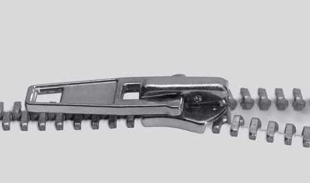 low angle view of of a zipper in light backの写真素材