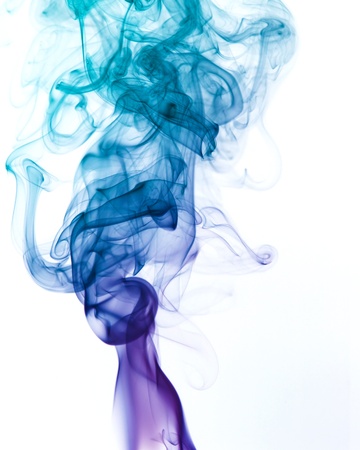 abstract picture showing some blue and violet colored smoke in white backの写真素材