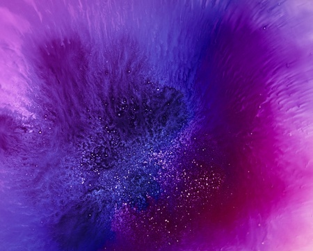 spacy abstract background with translucent vibrant colors and salt particles over transmitted light