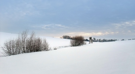 idyllic rural winter scenery at evening time in Hohenlohe, an area in Southern Germanyの写真素材