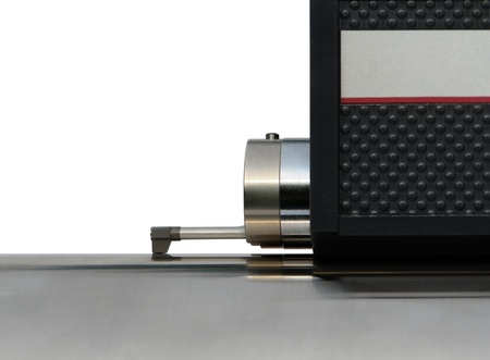 studio photography of a surface measuring instrument isolated on white with clipping pathの写真素材