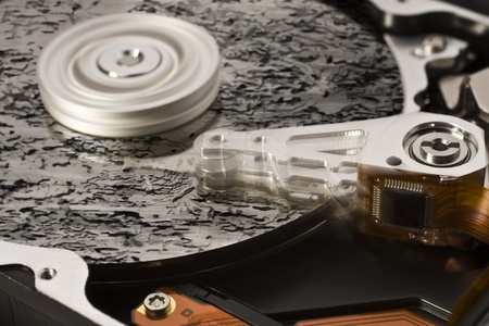 symbolic data loss theme showing a open hard disk with symbolic rotten data