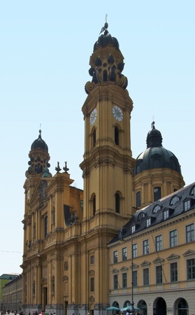 detail of the Theatinerkirche in Munich (Bavaria, Germany) at evening time in front of blue skyの写真素材