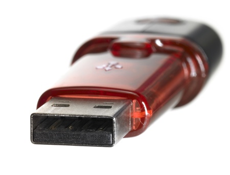 frontal shot of a red USB stick isolated on white