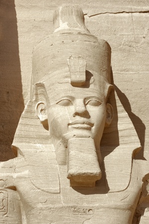 architectural detail of the historic Abu Simbel temples in Egypt (Africa) showing a sculpture of...