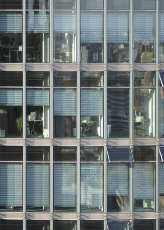 detail of a skyscraper with transparent glass facade in Berlin (Germany)
