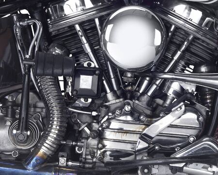 detail shot showing the engine of a motorbike
