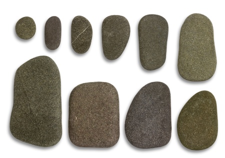 two rows of graded flat pebble stones in light back