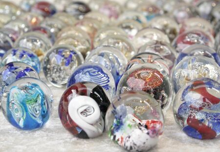 lots of colorful marbles made of glassの写真素材