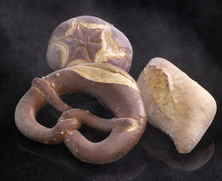 frozen german lye rolls and bread roll in black reflective back