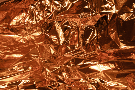 full frame creased copper foil backgroundの写真素材