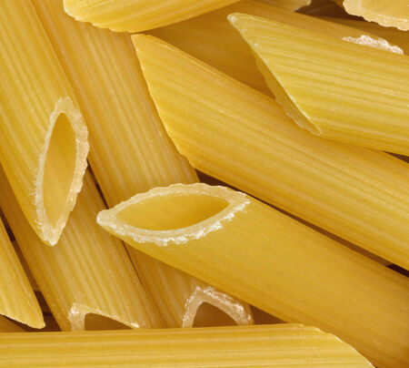full frame background with lots of italian Rigatoni noodles