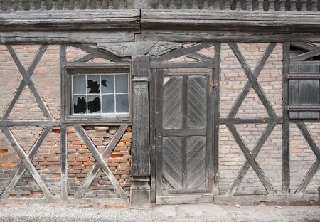 facade detail of a rundown barn seen in Colmar, Alsace, Franceの写真素材