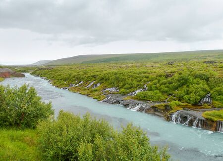 Series of waterfalls in Iceland named Hraunfossarの写真素材