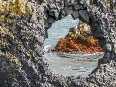 rocky coastal scenery in Icelandの写真素材