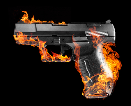 a burning black pistol in black back