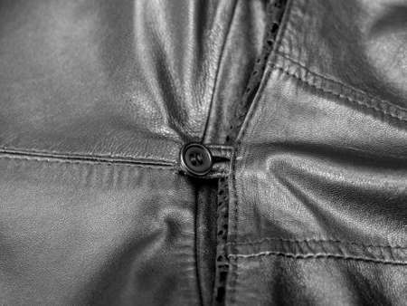 detail of a black leather coat