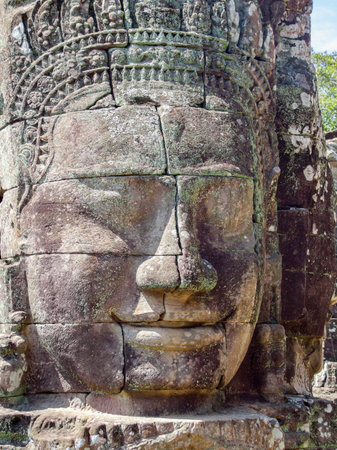 sculpture detail at the Bayon temple at Angkor in Cambodiaのeditorial素材