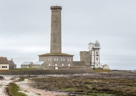 coastal scenery with lighthouse  around Penmarch in the Finistere department of  Brittany in Franceの写真素材