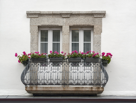 historic small balcony at Pont-Aven, a commune in the Finistere department of Brittany in northwestern France.の写真素材