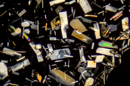 microscopic shot showing colorful microcrystals in polarised lightの写真素材