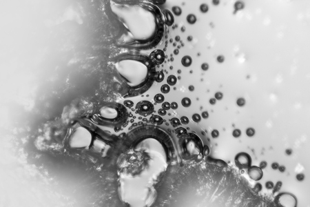 microscopic shot showing abstract bubble inclusions