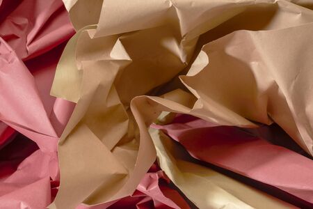 full frame red and brown crumpled paper background